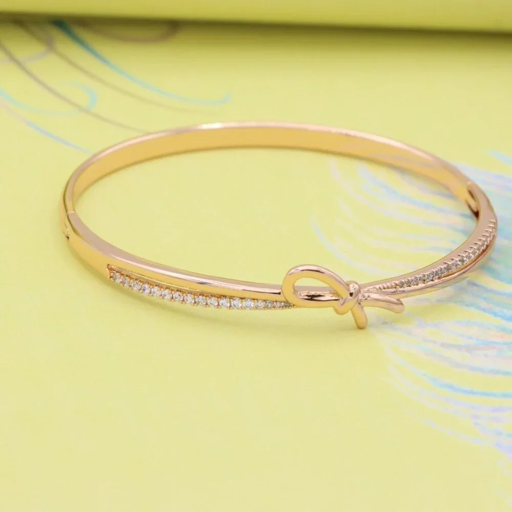 Rose Gold Bow Knot Bangle with Sparkling CZ Accents, XPBL0427